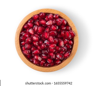 Pomegranate seeds in a separate wooden bowl on a white background, top view
