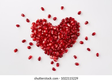 Pomegranate Seeds In A Shape Of A Heart