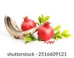 Pomegranates and shofar symbol of the Jewish holiday-Rosh Hashanah white background.