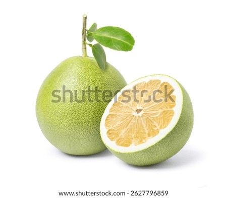 Pomelo fruit with leaf and half slice isolated on white background.