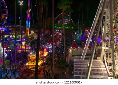 Pomona, California USA - September 23rd, 2018. Aerial View Of Street In LA Country Fair Filled With People Who Are Walking, Eating And Shopping In Festival At Night Time.