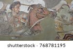 Pompeii, Italy - April 1, 2017: Ancient roman mosaic of Alexander the Great in battle against Darius, from Pompeii site.