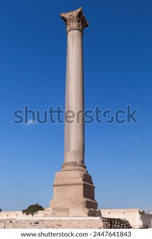 The Pompeys Pillar. It is an ancient Roman triumphal column located in Alexandria, Egypt. Vertical photo