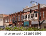 Ponca City, Oklahoma, USA - June 24, 2023: Morning sun shines on the historic downtown cityscape of Ponca City.