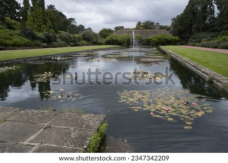 pond and fountain view from Wisley Gardens old building in August
