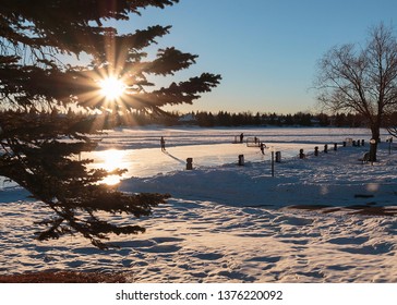 Pond Hockey At Sunset