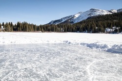 Pond Ice Rink In The Mountains Of Colorado