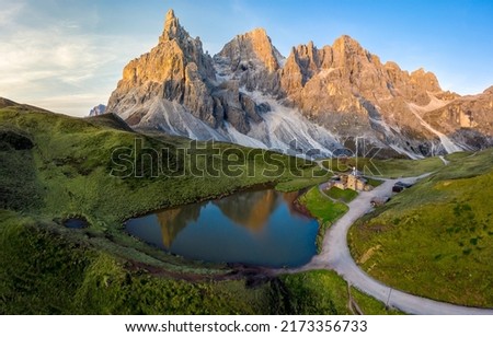 Pond at the mountain high top. Beautiful mountain background in Europe