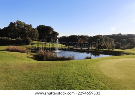 Pond on a golf course in Algarve, Portugal on a sunny winter day.