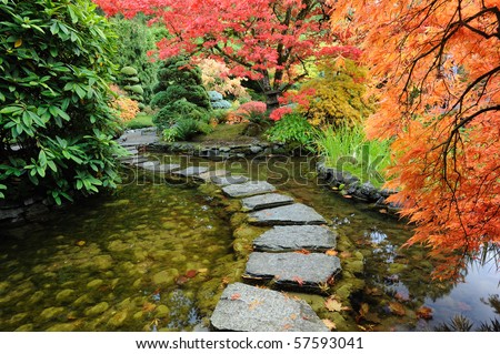 Pond and path of the japanese garden inside the famous historic butchart gardens (built in 1903), vancouver island, british columbia, canada