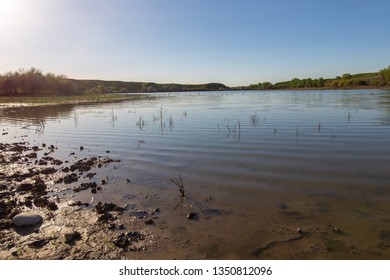 Pond in spring steppe as background.