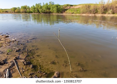 Pond in spring steppe as background.