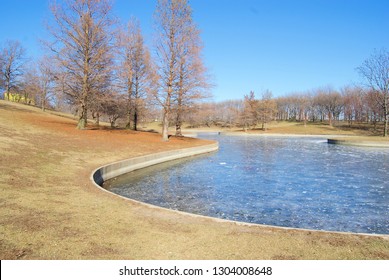 Pond In St. Louis Arch Park During Winter