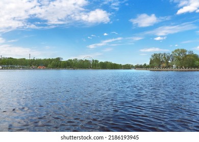 Pond Verhniy In Kaliningrad With Part Of Amusement Park And Ferris Wheel View 