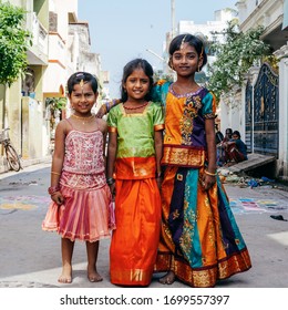 Pondicherry, India - December, 17th, 2016.  Small beautiful girls in traditional indian dresses during the celbration the Hindu festival of Pongal.