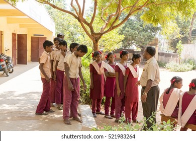 Pondichery, Tamil Nadu, India - March 03, 2014. In The School, Teachers Preparing The Shooting Photo Of The Students. Children Very Excited Of This Moment.