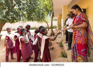 Pondichery, Tamil Nadu, India - March 03, 2014. In The School, Teachers Preparing The Shooting Photo Of The Students. Children Very Excited Of This Moment.