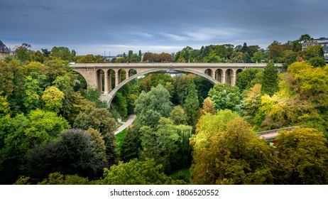 Pont Adolphe (Adolphe Bridge) And Vallé De La Pétrusse (Petrusse Park), In The Distance In The City Of Luxumbourg