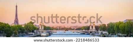 Pont Alexandre III bridge and Eiffel Tower at sunrise in Paris. France