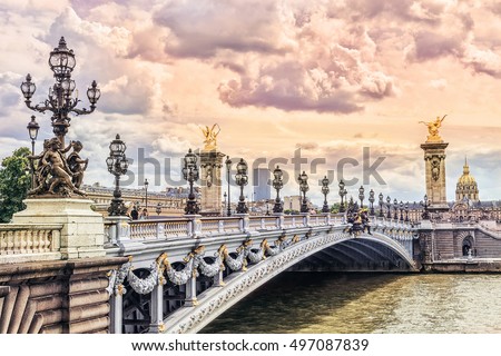 Pont Alexandre III (Alexandre III bridge) in Paris at sunset, France