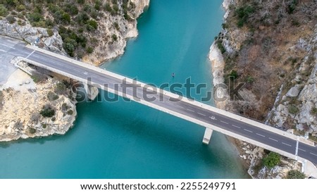 Pont du Galetas top view by drone. Road bridge between Aiguines and Moutiers Sainte Marie upstream from the Lac de Sainte Croix, in France, in Europe.
