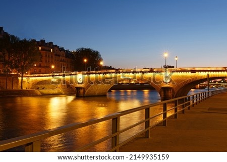 The pont Louis Philippe is a bridge across the river Seine. It is located in 4th district of Paris , it links the quai de Bourbon on the Ile Saint Louis with the Saint Gervais on the right bank.