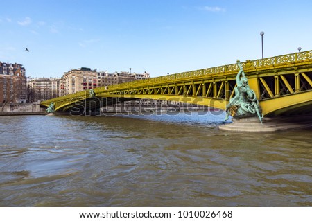 Pont Mirabeau over the Seine - Paris France. The Mirabeau bridge was built between 1895 and 1897. It spans the Seine from the 15th arrondissement on left bank, to the 16th arrondissement.