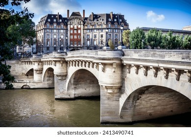 Pont Neuf Bridge over the River seine in the heart of Paris France