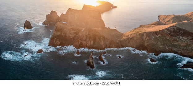 Ponta de Sao Lourenco, Madeira,Portugal. Beautiful scenic mountain view of green landscape,cliffs and Atlantic Ocean. Hiking active day fresh summer scene. Travel holiday background