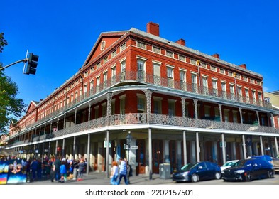 The Pontalba Buildings Form Two Sides Of Jackson Square In The French Quarter, New Orleans. The Red-brick, One-block-long, Four‑story Buildings Built In 1849-1851