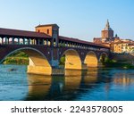 The Ponte Coperto is a bridge over the Ticino river in Pavia, it is one of the symbols of the city of Pavia, it has five arches, it is completely  covered with two portals at the ends