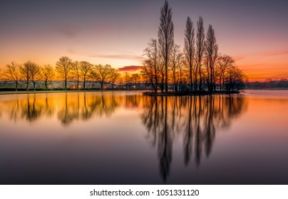 Pontefract Park Lake Near Wakefield, Sunrise Reflections Near Pontefract Racecourse, West Yorkshire, UK