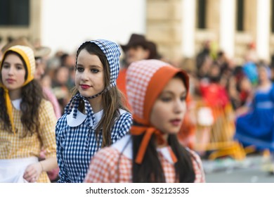 PONTEVEDRA, SPAIN - FEBRUARY 21, 2015: Detail of the participants in the costume parade during the Winter Carnival, through the streets of the city. - Shutterstock ID 352123535