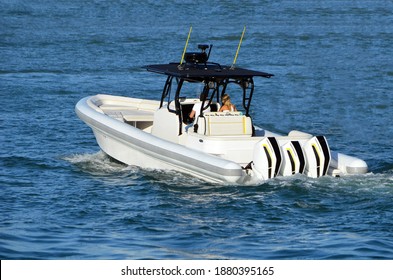 Pontoon Motor Boat Powered By Three Powerful Outboard Engines