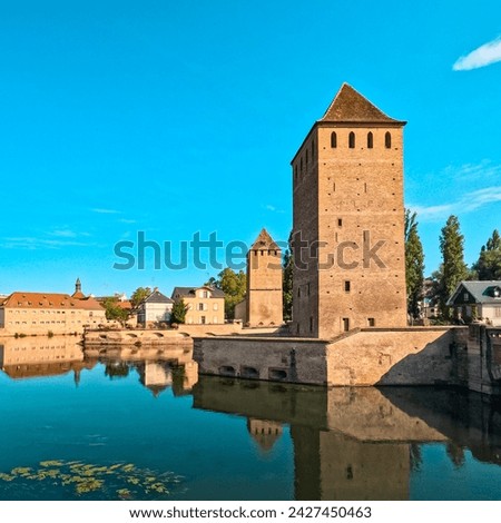 The Ponts Couverts  are a set of three bridges and four towers that make up a defensive work erected in the 13th century on the River Ill in the city of Strasbourg in France.