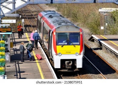 Pontyclun, Wales - March 2022:  People Getting On And Off A Train Operated By Transport For Wales At The Railway Station In The Village Of Pontyclun In South Wales