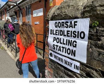 Pontypridd, Wales - May 2021: Queue Of People Waiting To Enter A Polling Station In A Village Hall