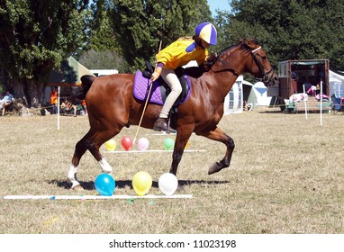 Pony Club Games With The Rider About To Pop A Balloon