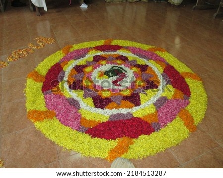 Pookkalam or Athapookkalam- A kind of flower rangoli well arranged to make a specific pattern- done during ONAM keralas celebration 