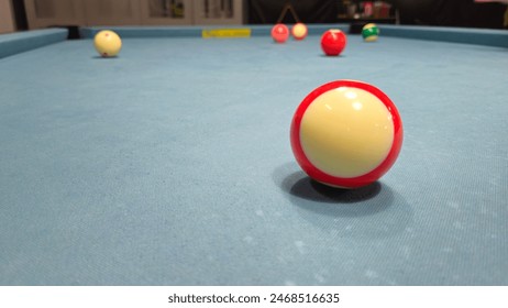 Pool balls on gray table sport game set known as eight ball pool, six pockets.