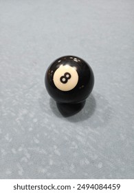 Pool balls on gray table sport game set known as eight ball pool. Number eight.
