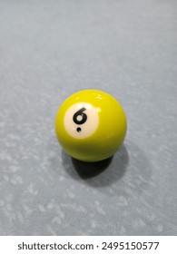 Pool balls on gray table sport game set known as eight ball pool. Number six.