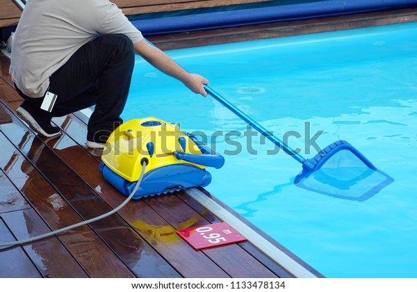 Pool Cleaner During His Work Cleaning Stock Photo Edit Now