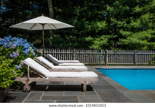 pool lounge chair with umbrella