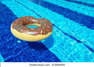 Pool Inflatable In Donut Shape Floating In A Pool