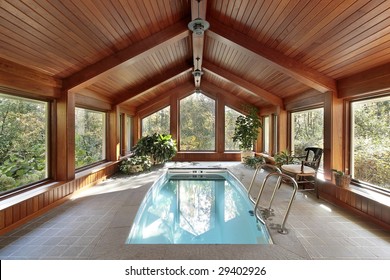 Pool In Luxury Home With Wood Ceiling