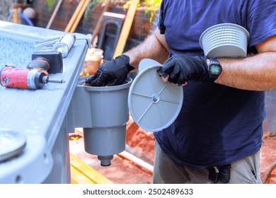Pool maintenance installed on frame pool skimmer basket collects dirt, trash with filtration system water surface cleaning caring for home swimming pool