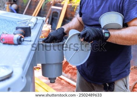 Pool maintenance installed on frame pool skimmer basket collects dirt, trash with filtration system water surface cleaning caring for home swimming pool