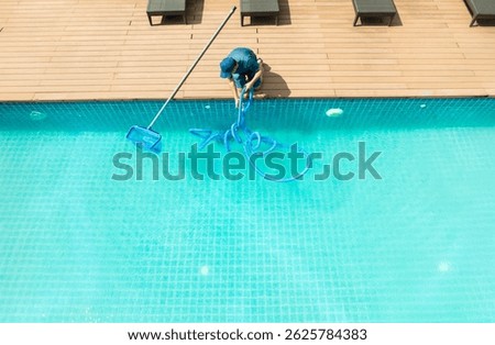 Pool maintenance with scoop net  and automatic robot cleaner.