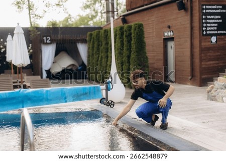 Pool maintenance worker checking water quality in a hotel resort, ensuring hygiene and safety for guests